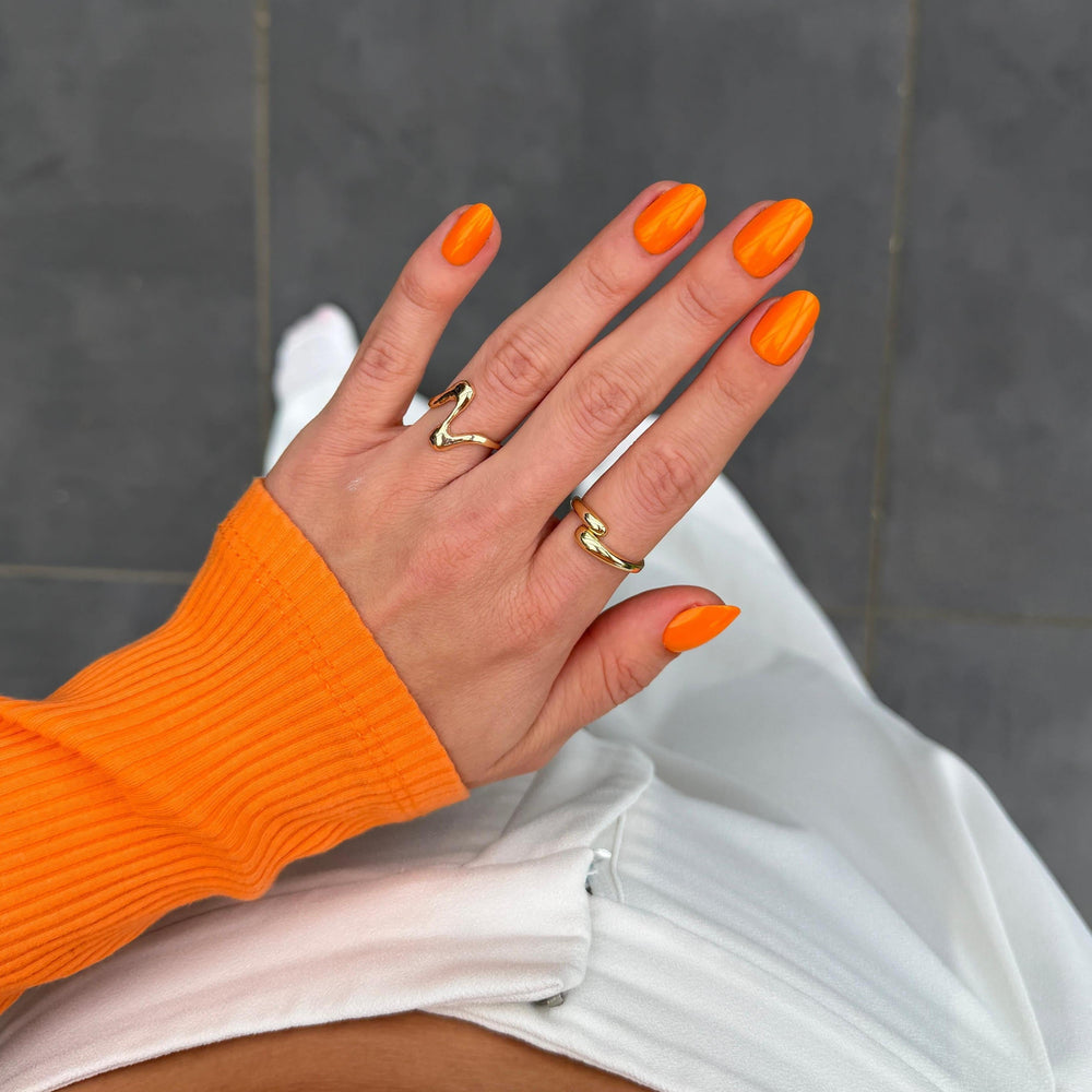 Knaloranje plaknagels met glossy finish van Freaky Nails